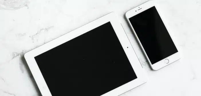 white iPad and silver iPhone 6